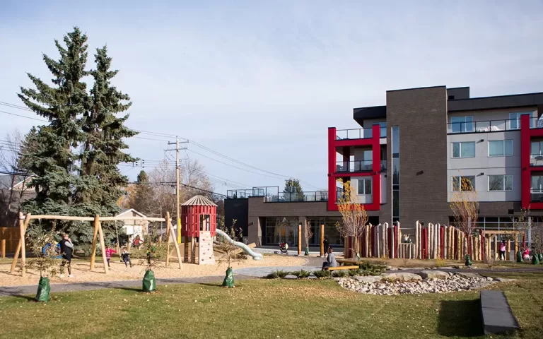Calgary Mills Park wood playground jpg 768x480