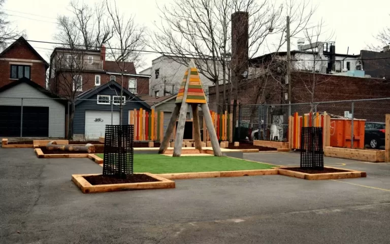 Holy Name Catholic School 001.JPG school playground natural tower log fence sand 1080x675 1 jpg 768x480